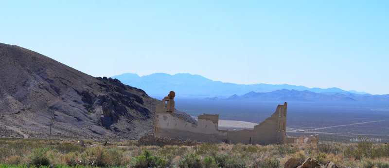 Wide shot of mountains and Rhyolite Ghost Town